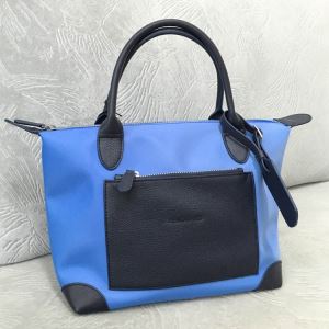 Manici in pelle della borsa in nylon
